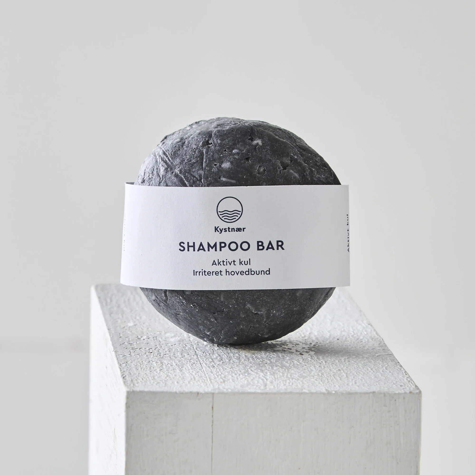 Aktivt Kul Shampoo, Mod skæl og irriteret hovedbund